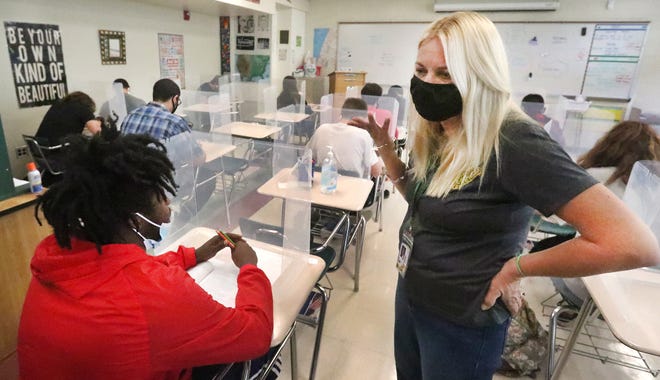 Marlo Jones, a U.S. history teacher, gestures as she makes a point to her students on Nov. 20 at DeLand High.